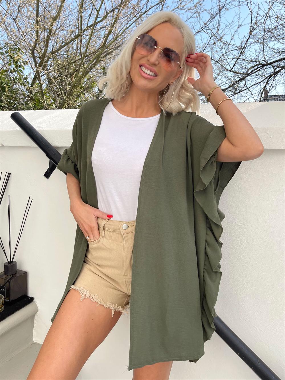 Sabbie - Cardigan med flæsekant